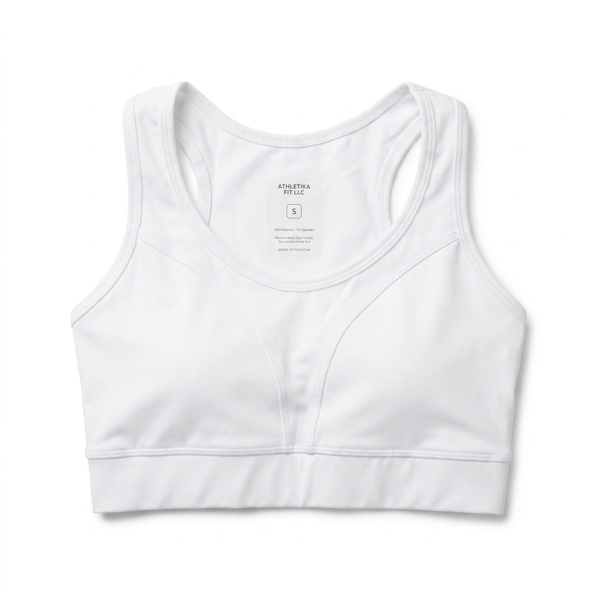 Athletika Fit soccer sports bra, smooth white, no surface pattern — front